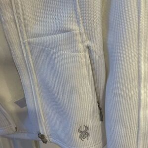 Spider white windbreaker - size medium-  used but never worn.